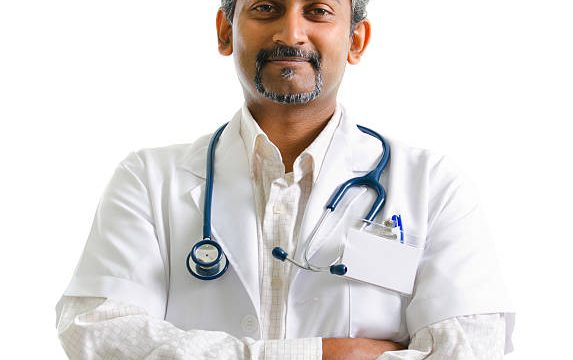Indian mature male doctor crossed arms on white background